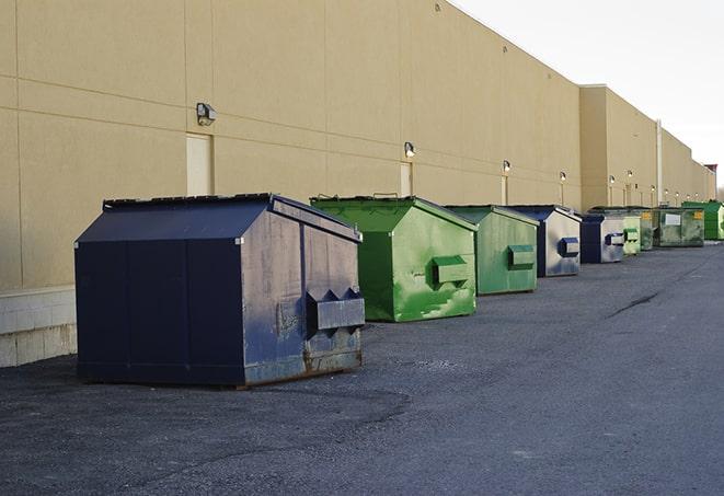 brightly colored dumpsters filled with construction waste in Belvedere CA